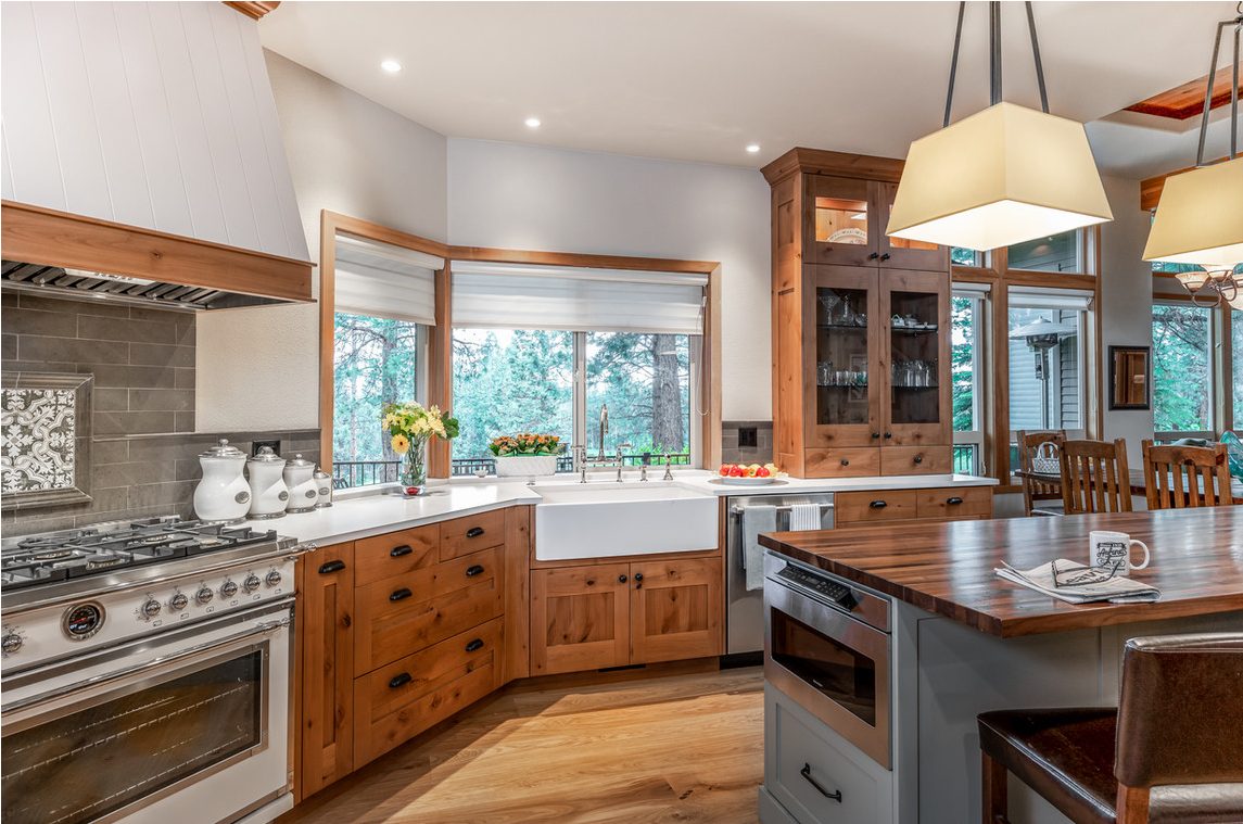 Farmhouse kitchen with butcher block island and knotty alder cabinetry in Bend, Oregon